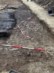 A stoned surface along the southern edge of the excavation